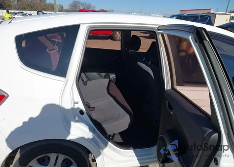 2009 Honda Fit from USA, damaged, VIN JHMGE88229S009402